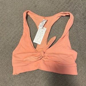 Brand new, with tags L Space ribbed bikini top.